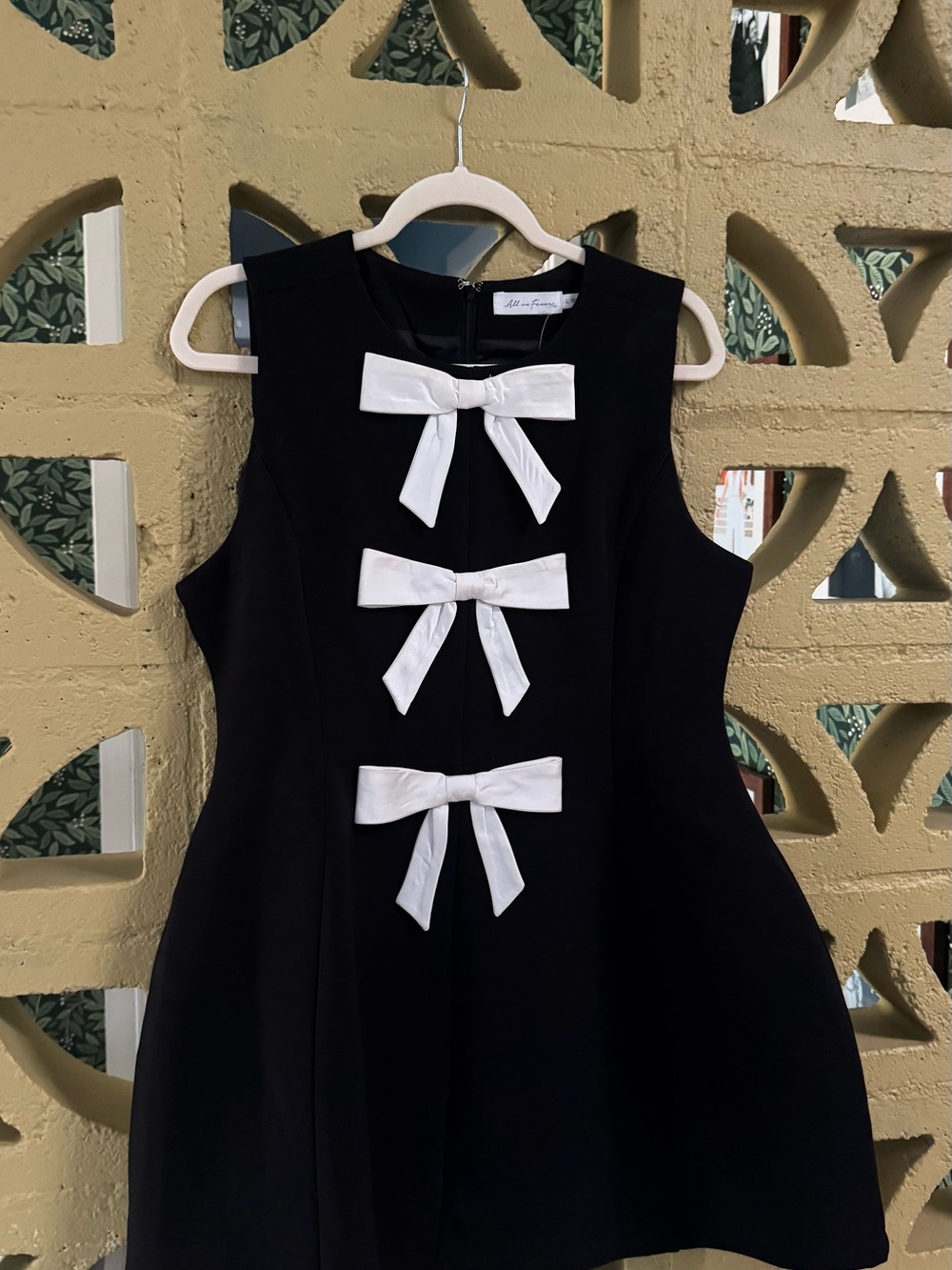 Women’s Black Dress with White Bow Details
